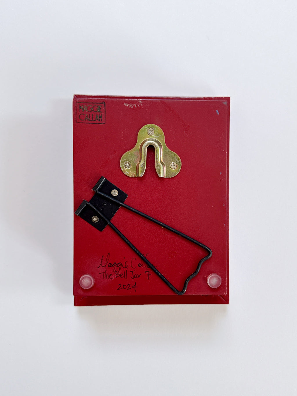 Red box with gold latch on a white background