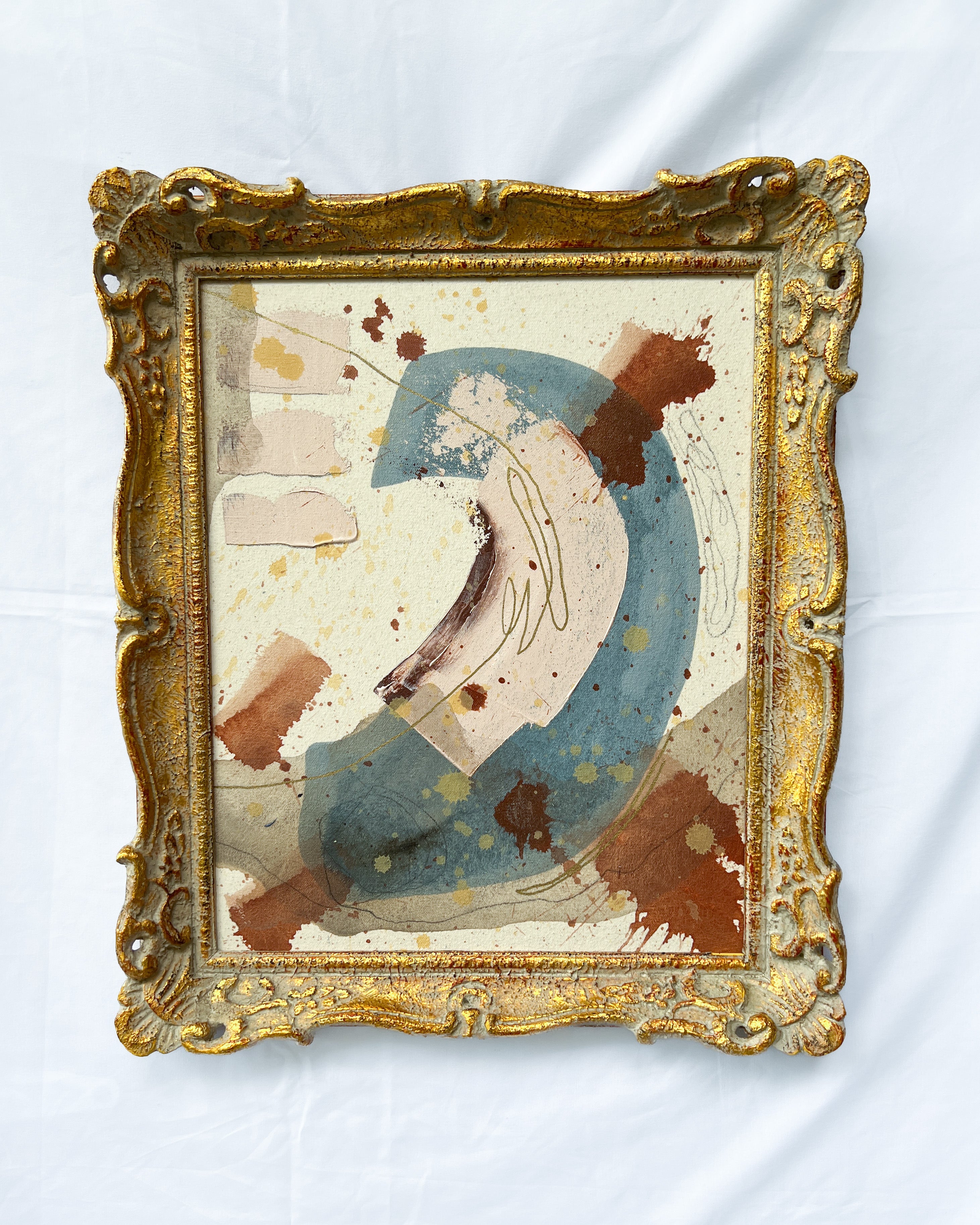 Abstract painting with a gold frame by New Orleans artist Maggie Callan