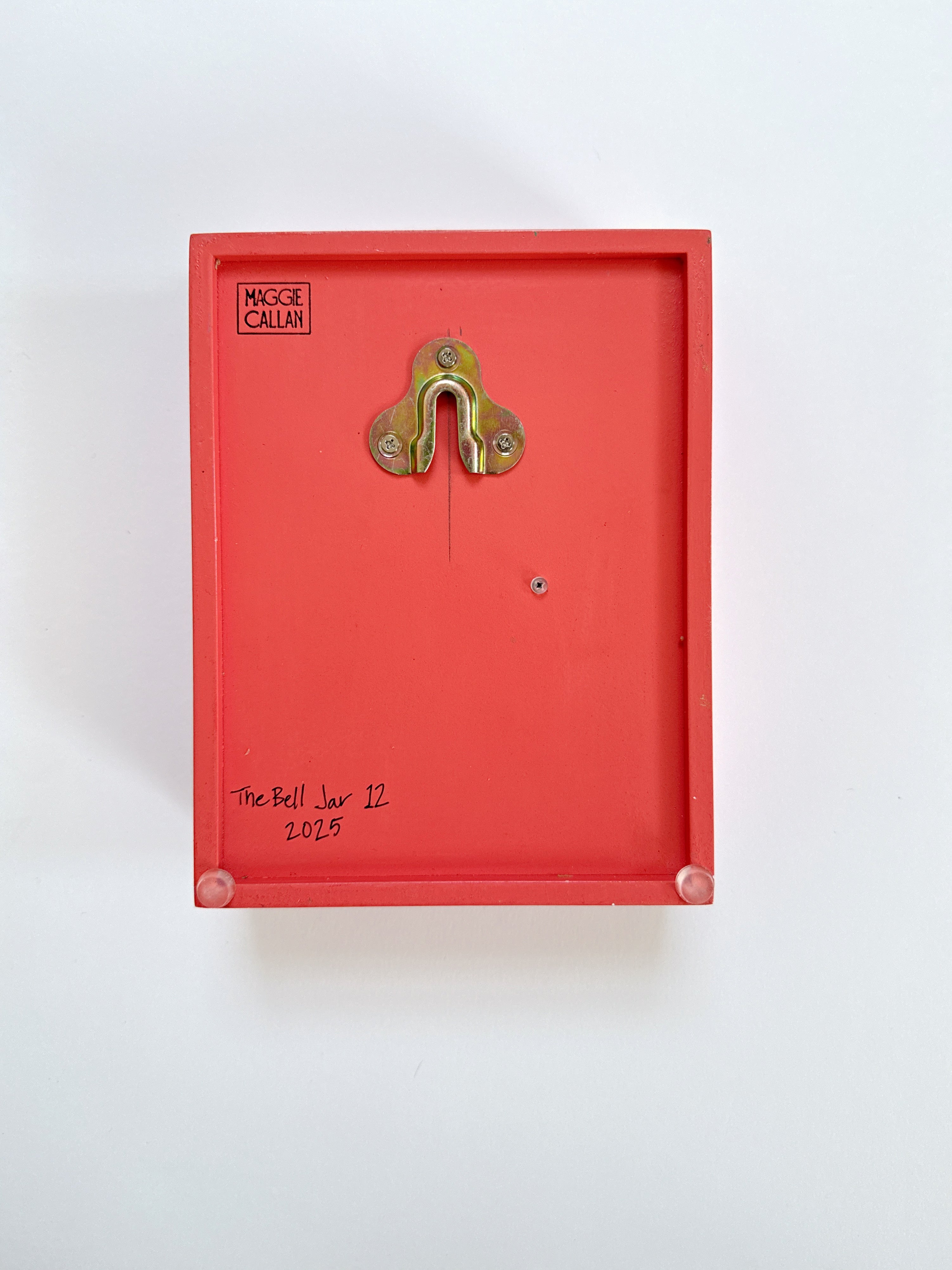Red box with a gold latch on a white background