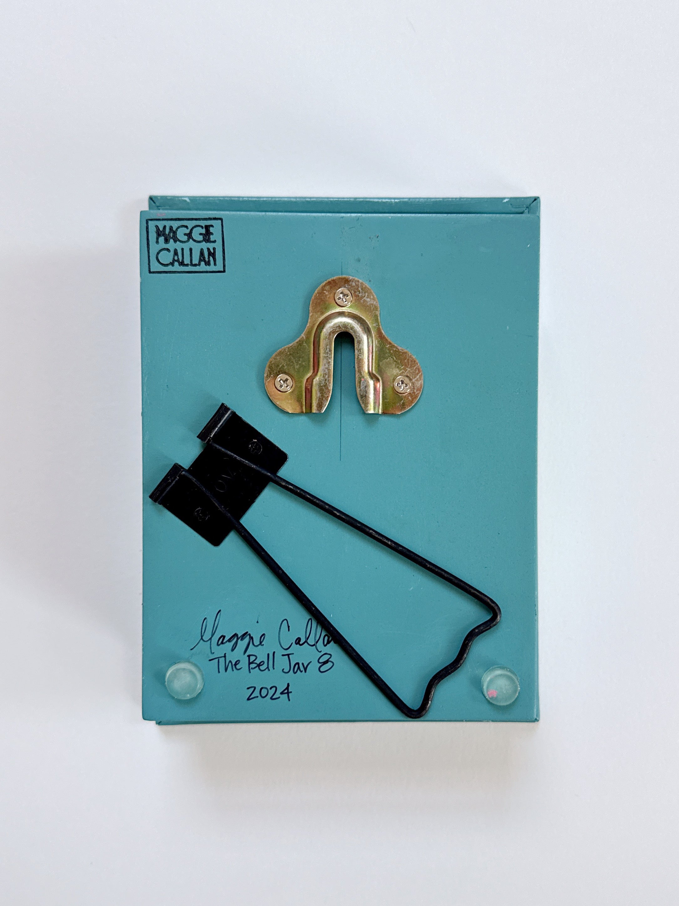 Teal box, the back of artwork by New Orleans artist Maggie Callan